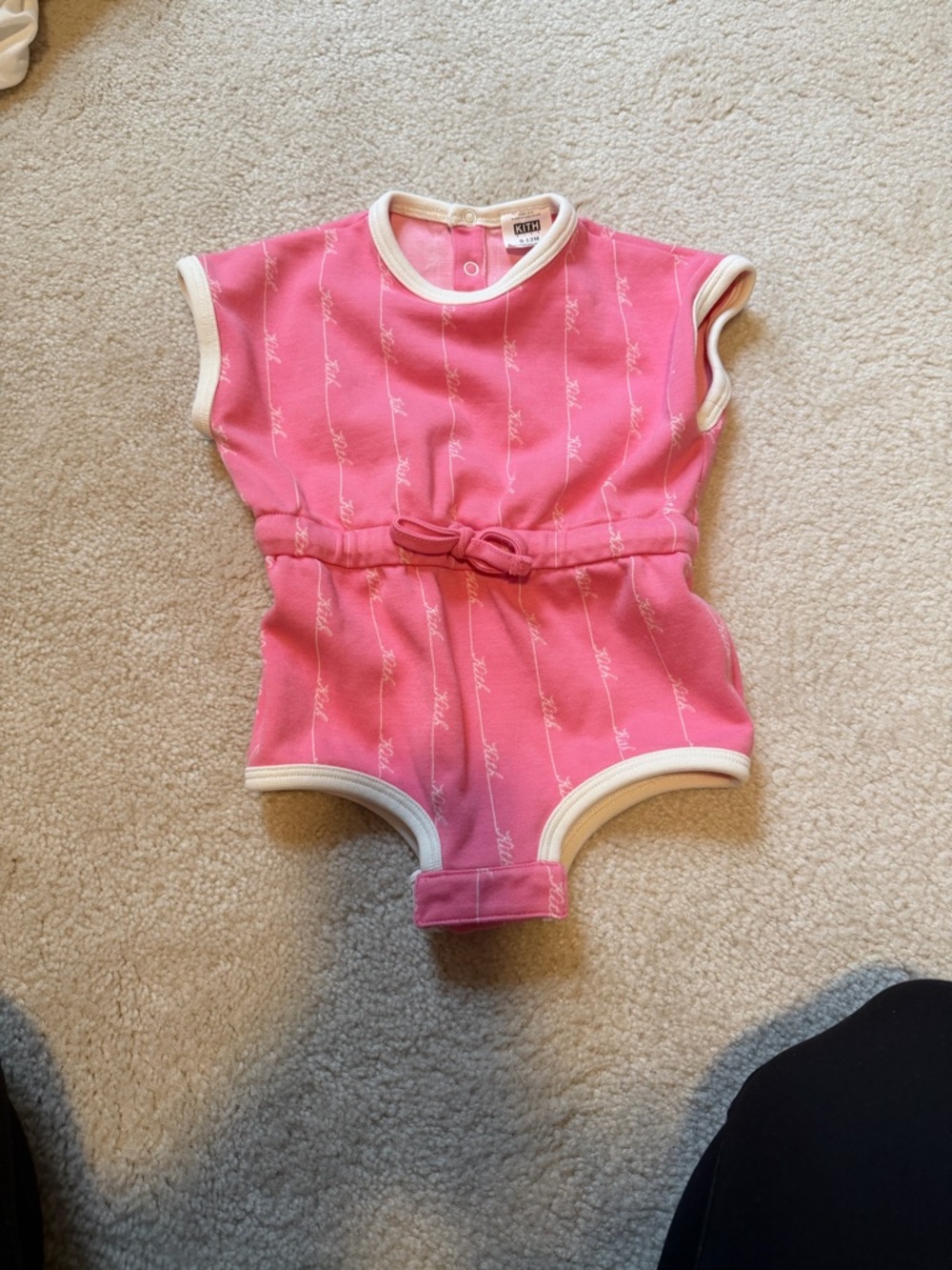 Kith Pink Infant Romper with White Trim and Script Detail